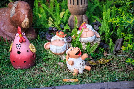 Doll Garden Decoration Sculpture made ââof ceramics Commonly used to decorate a small garden to add a beautiful piece の写真素材