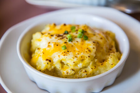Baked potato with cheese, Italian cuisine is popular around the world の写真素材