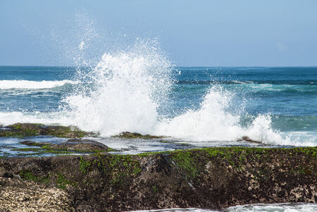 Sea waves hitting the rocks More travel on the island of Bali の写真素材