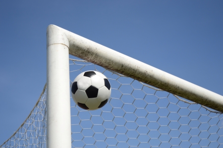 Soccer Football. Ball Win Goal Under Blue Sky.の素材