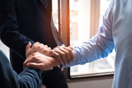 Business joined hands for brainstorming about strategy of business or working. Concept of teamwork.の写真素材