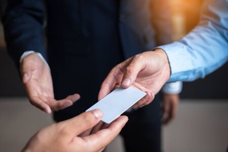 Two of Businessman exchange business card for first time meet.の写真素材