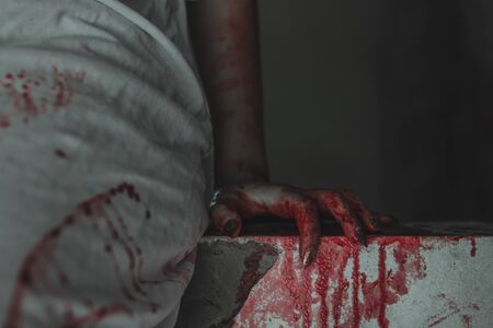 Close up ghost zombie hand with blood. Halloween Horror concept.