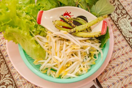 Many vegetables on the plate soft focus,Eat with noodles.
