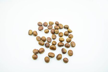Fresh chestnuts close-up isolated on white background.の写真素材
