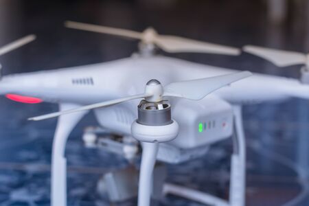 White drone, quadrocopter with photo camera flying concept.の写真素材