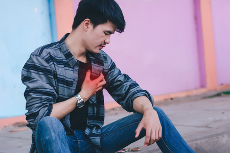 Men's chest pains.Health concept.の写真素材