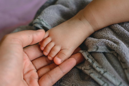 Foot of newborn babyの写真素材