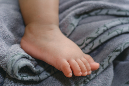 Foot of newborn babyの写真素材