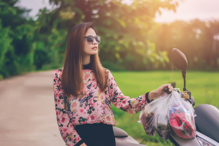 Young woman wit plastic bags,shopping concetp.の写真素材