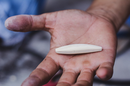 Hand made fishing lures. Making handcrafted fishing lures made of wood.の写真素材
