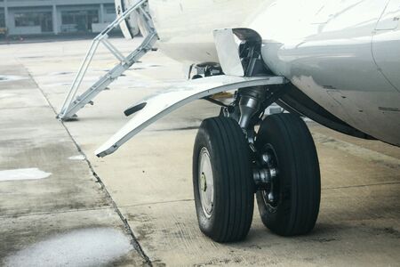 Side plane wheels and machine entrance doors.