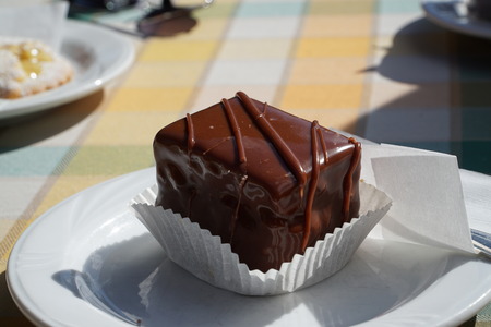 Chocolate cake on white plateの写真素材