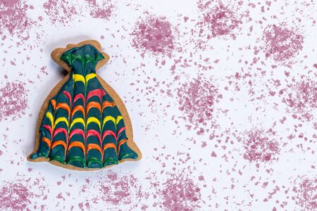 gingerbread bag with santa claus gifts on a white background with color watercolor stainsの写真素材