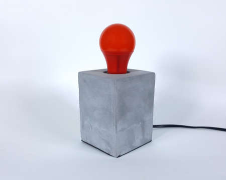 Red light bulbs and Loft lamps in a white backdrop.の写真素材