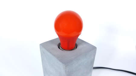 Red light bulbs and Loft lamps in a white backdrop.の写真素材