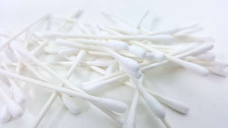clean cotton bud and white backdropの写真素材