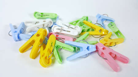 Colorful clothespins and white backgroundの写真素材