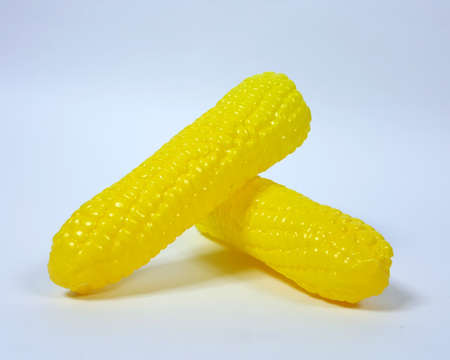 Children's toy corn And white backgroundの写真素材