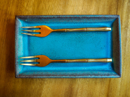 twin fork on dishの写真素材