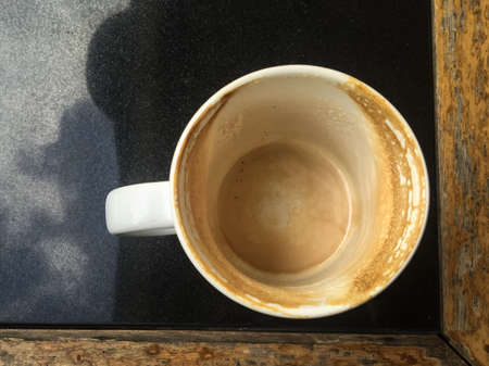 Empty Cup of Coffee on a Tableの写真素材