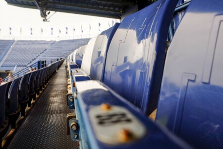 Navy blue amphitheater in football arenaの写真素材