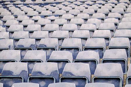 Navy blue amphitheater in football arenaの写真素材