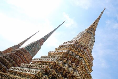 Thai pagoda with sky background at Wat Pho Bangkok, Thailandの写真素材