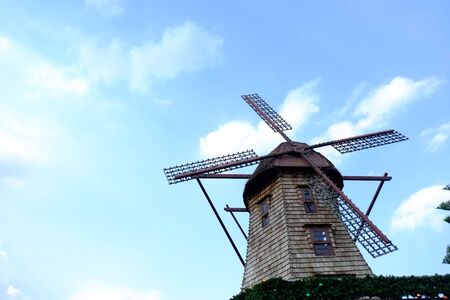 Windmill with sky background at Chocolate Ville Bangkok Thailandの写真素材