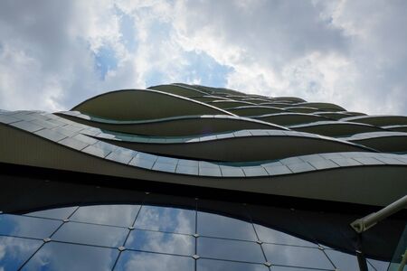 wave floor office building facade at bangkok thailandの写真素材