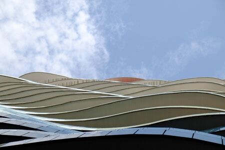 wave floor office building facade at bangkok thailandの写真素材