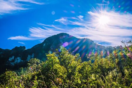 big mountain with clear blue sky and backlitの写真素材