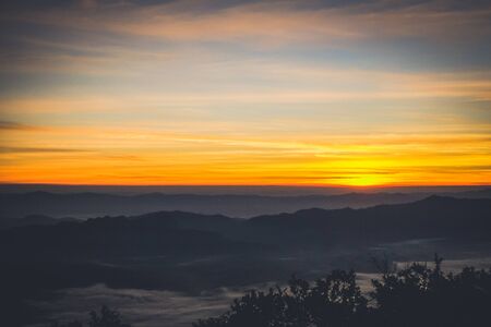 sky shading in the morning from orange to blueの写真素材