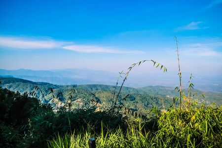 mountainscape with sunlight and sky backgroundの写真素材