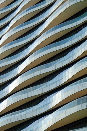 wave floor office building facade at bangkok thailandの写真素材