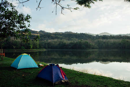 Camping the river outdoor Camping. Glamping lifestyle. Rugged camping trips.の写真素材
