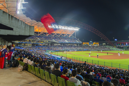 Taichung, Taiwan - October 12, 2015: Many fans watch the game atTaichung Intercontinental Baseball Stadiumのeditorial素材
