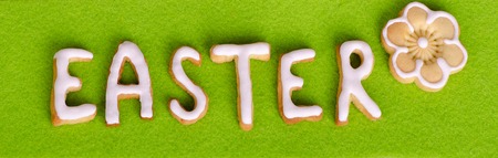 Easter cookies on a green background, Caption