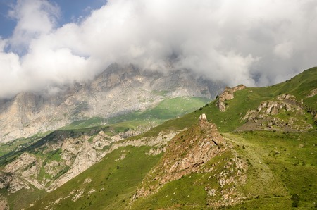 Mountain landscape. Medieval fortress on the top of the mountain in Kabardino - Balkaria, Caucasus,...