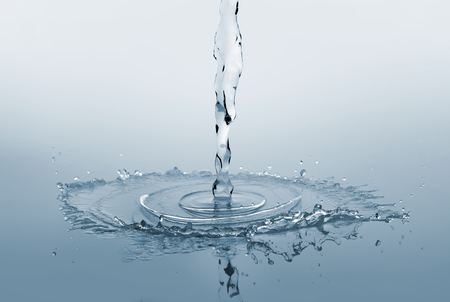 close up of pure water flowing and splashingの写真素材