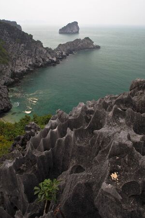 A veiw from the rugged top of Monkey Island, in Halong Bay, Vietnamの写真素材