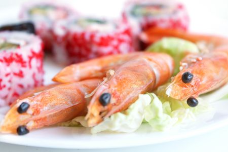 Sushi rolls with shrimps on the white plateの写真素材