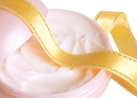 Opened box with cream isolated on the white backgroundの写真素材