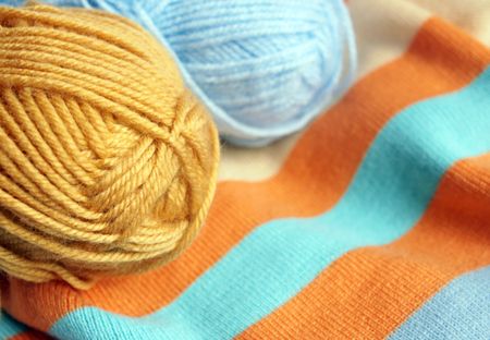 Colourful knitting with hanks of woolの写真素材