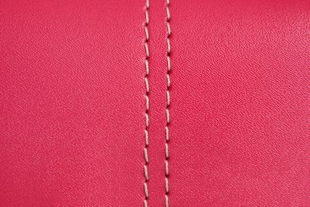 Natural red leather background closeupの写真素材