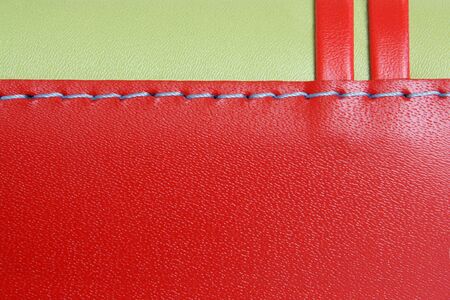 Natural red and green leather background closeupの写真素材