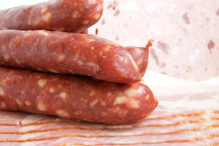 Close-up of cold cuts. Bacon and sausage.