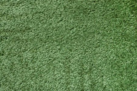 A green carpet texture, close-upの写真素材