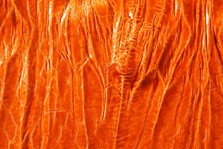 Natural orange leather background closeupの写真素材