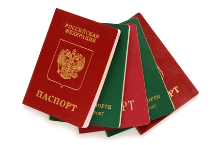 Russian and Uzbekistan passports on a white backgroundの写真素材